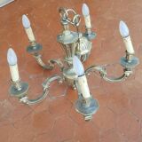Large old chandelier in gilded brass