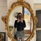 Beautiful Baroque Style Oval Decorative Mirror - Gilded with gold leaf with a Beautiful Patina