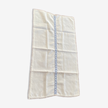 Embroidered table runner in cotton linen