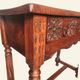 Castilian console table in carved walnut, early 20th century.