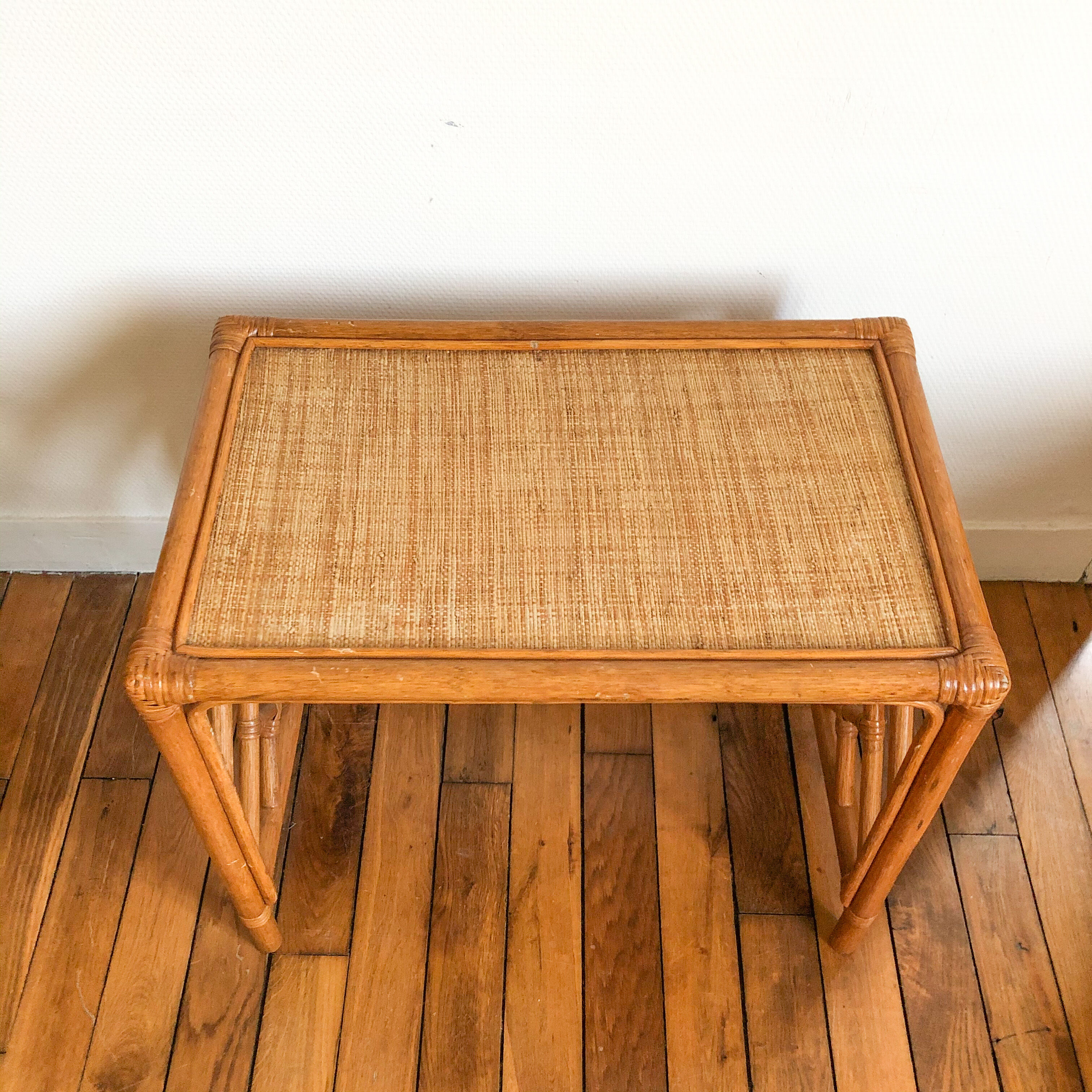Honey-coloured rattan side table