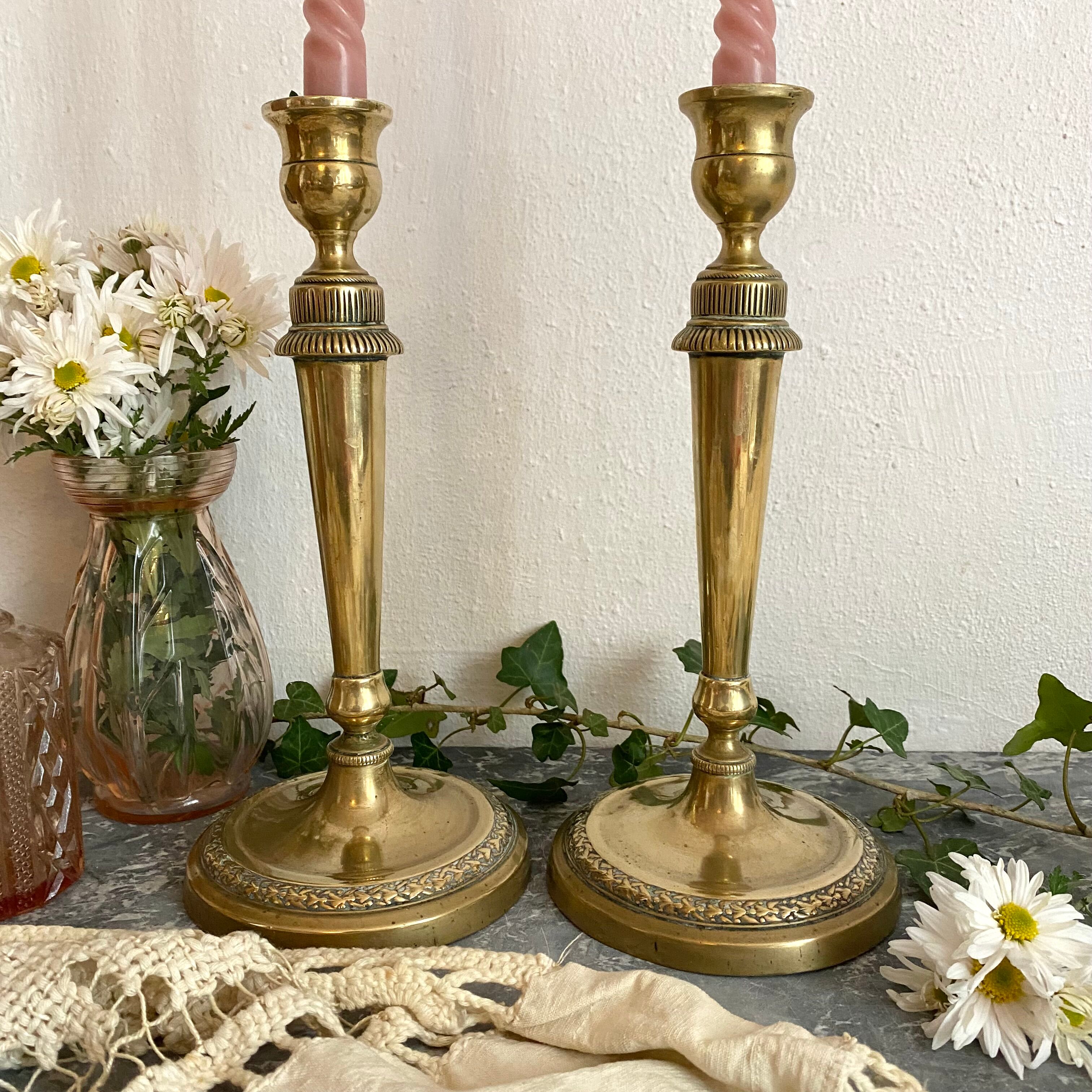Pair of old gilded brass candlesticks