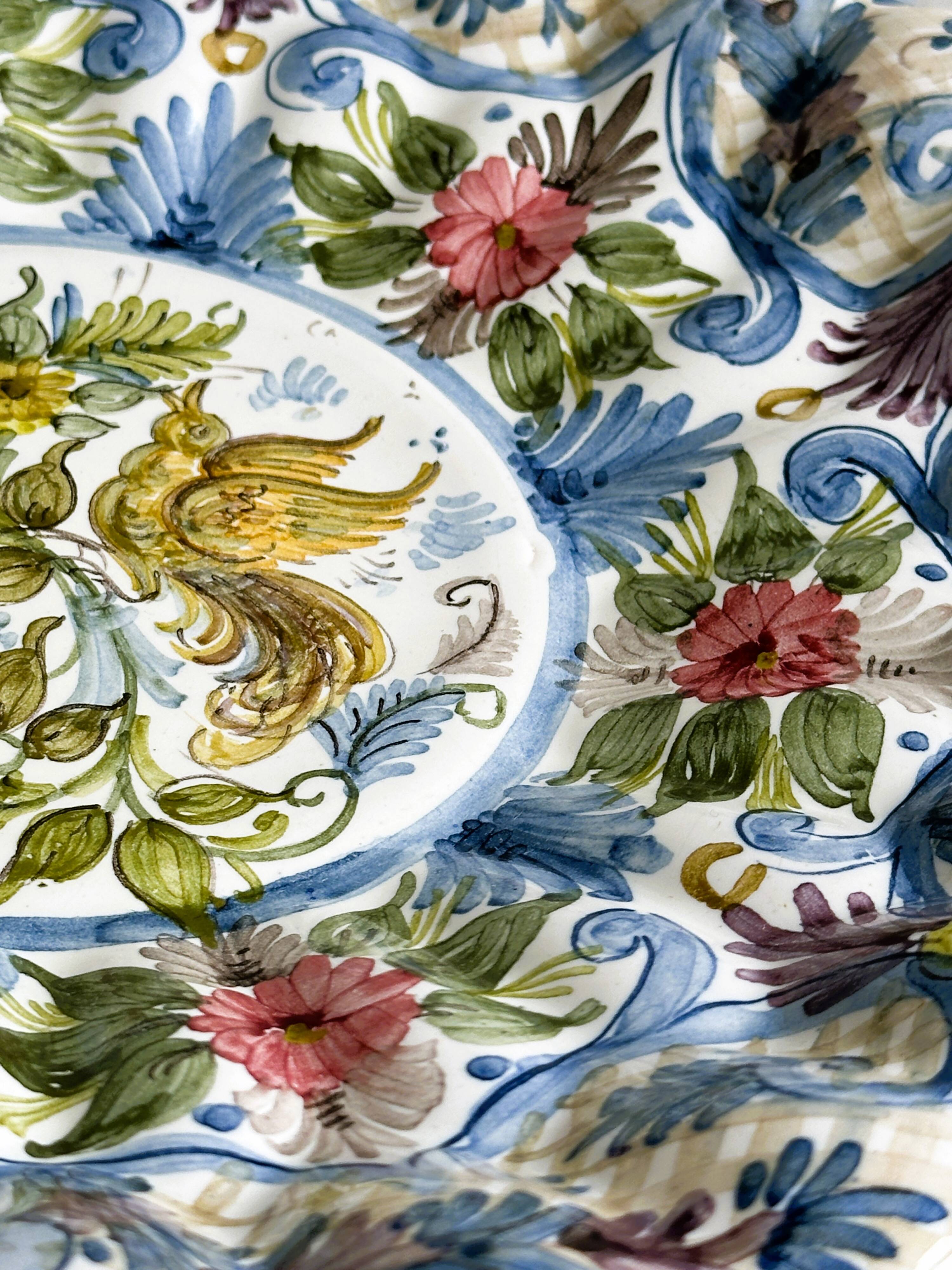 Hand painted decorative dish with floral motifs