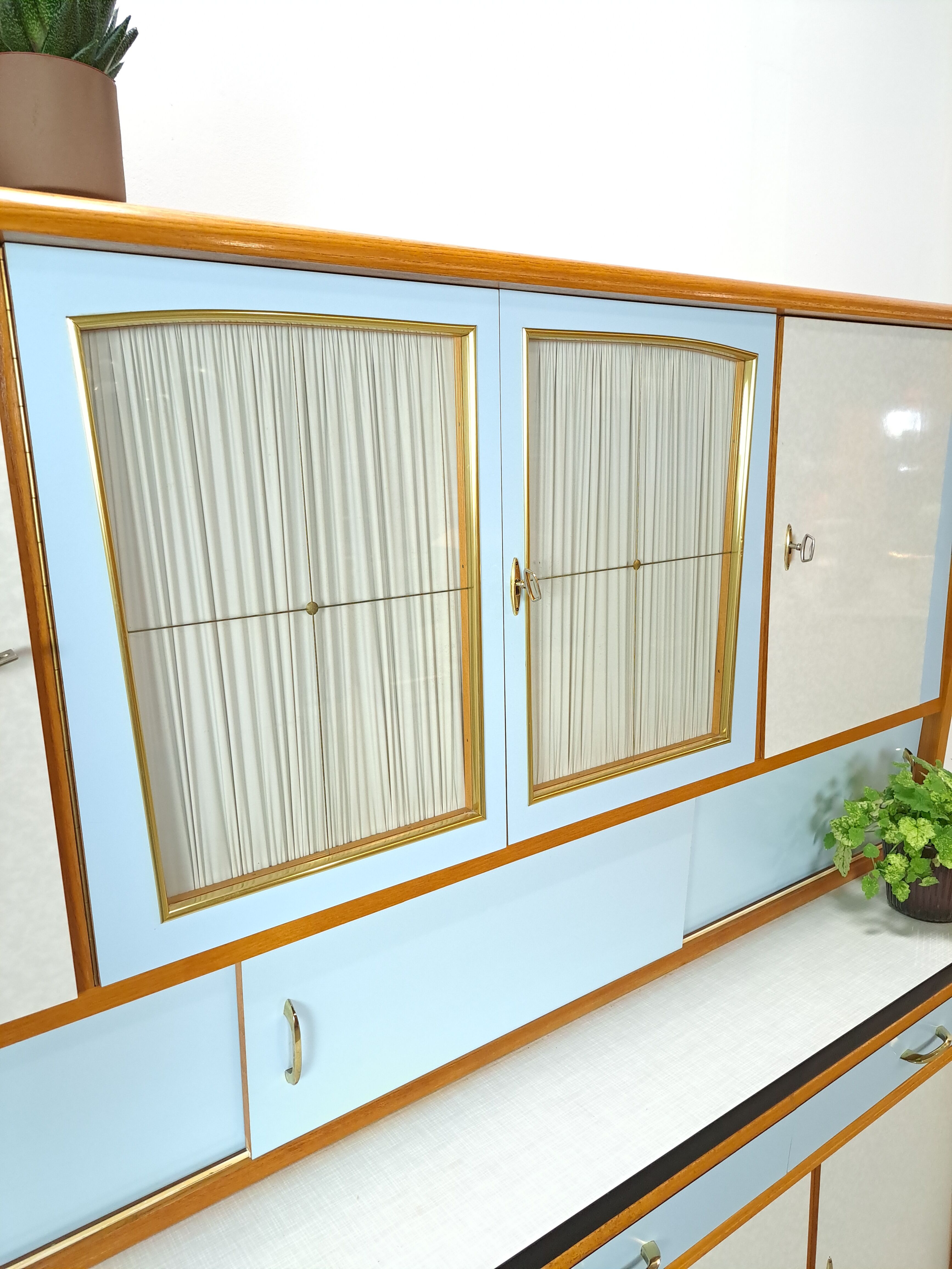 50s vintage kitchen cabinet with brass and formica