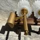 Old pair of wall sconces by Maison Lunel in brass and glass.