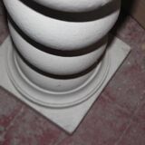 White plaster column, twisted.