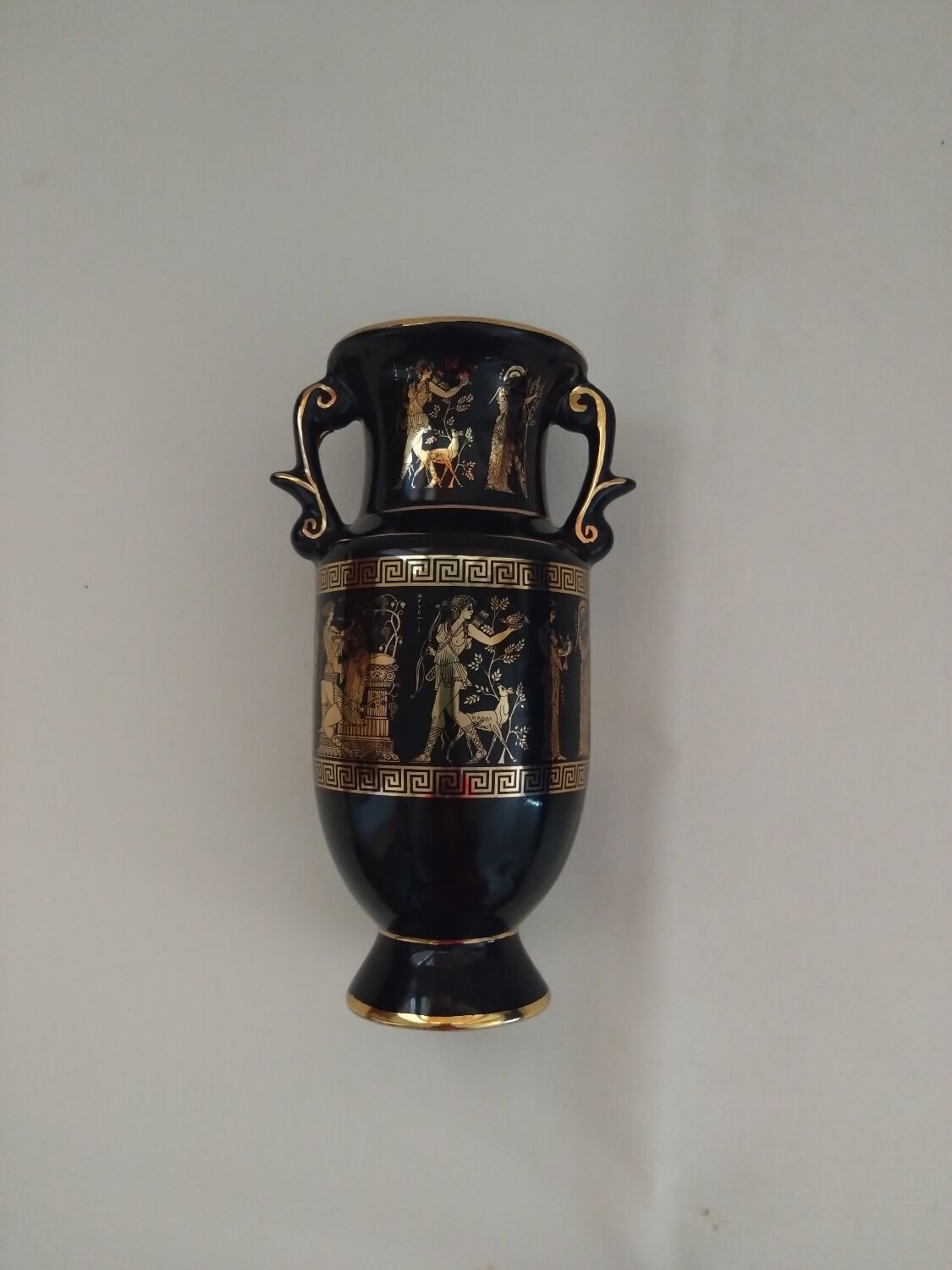 Petit vase noir et or