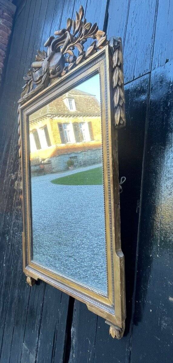 Louis XVI mirror in carved and gilded wood, 18th century