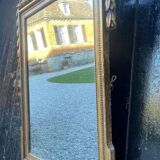 Louis XVI mirror in carved and gilded wood, 18th century