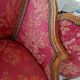 Pair of louis xv cabriolet armchairs with sculpted wood and pink & red floral fabric