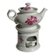 Complete porcelain teapot and warmer with pink floral decoration H18