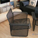 Pair of Italian armchairs in black lacquered metal with cushions from the house Talin