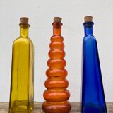 Trio of bottles 1970 color orange yellow and blue geometric shape