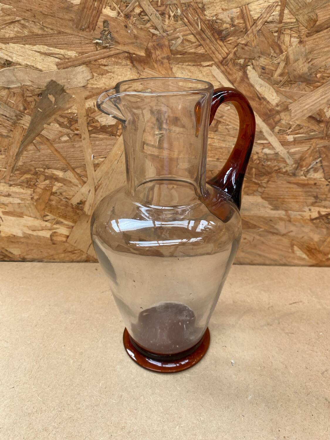 Antique clear blown glass pitcher + orange handle & foot vintage