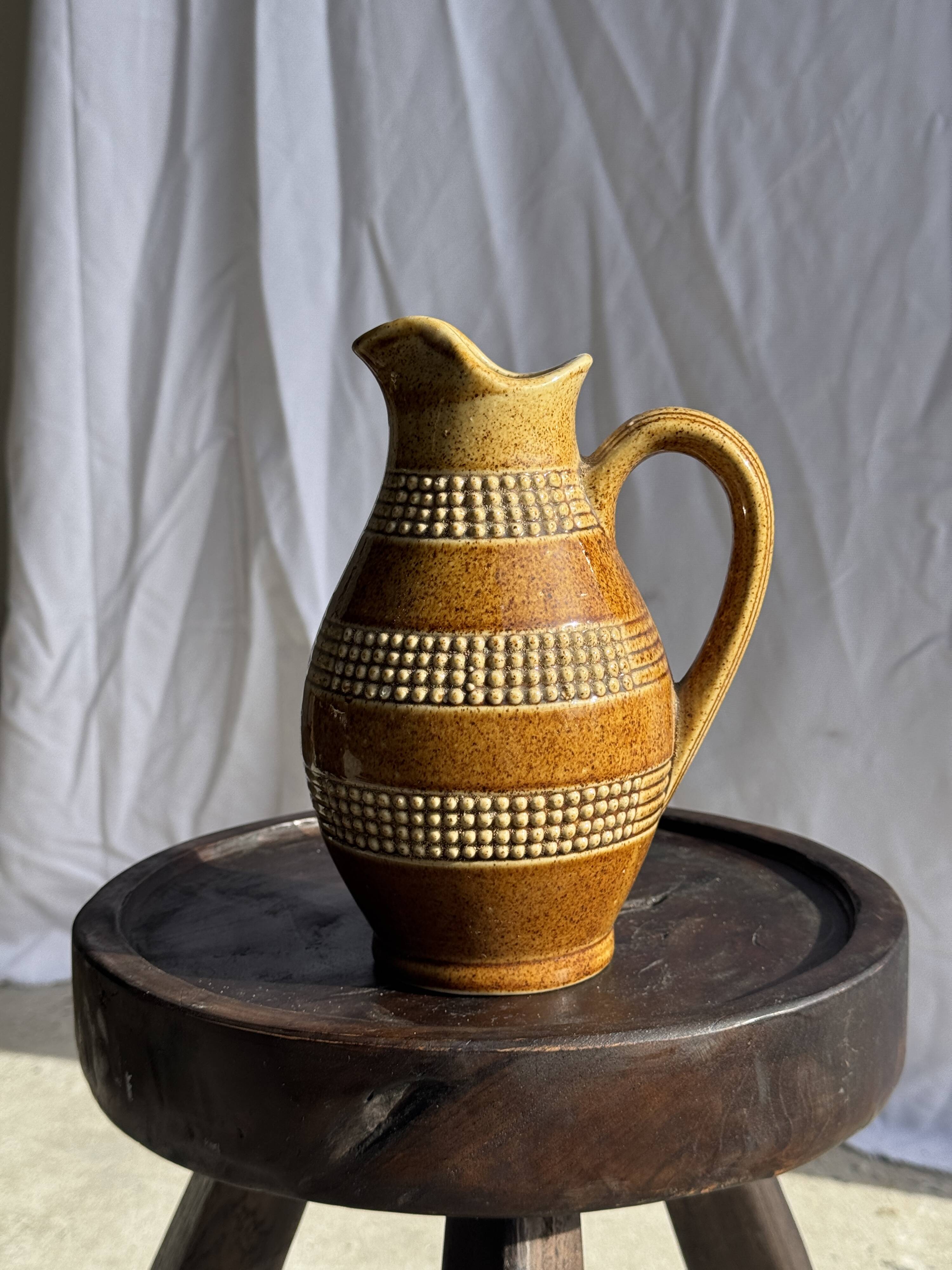 Vintage yellow stoneware carafe with beaded friezes Made in France H22