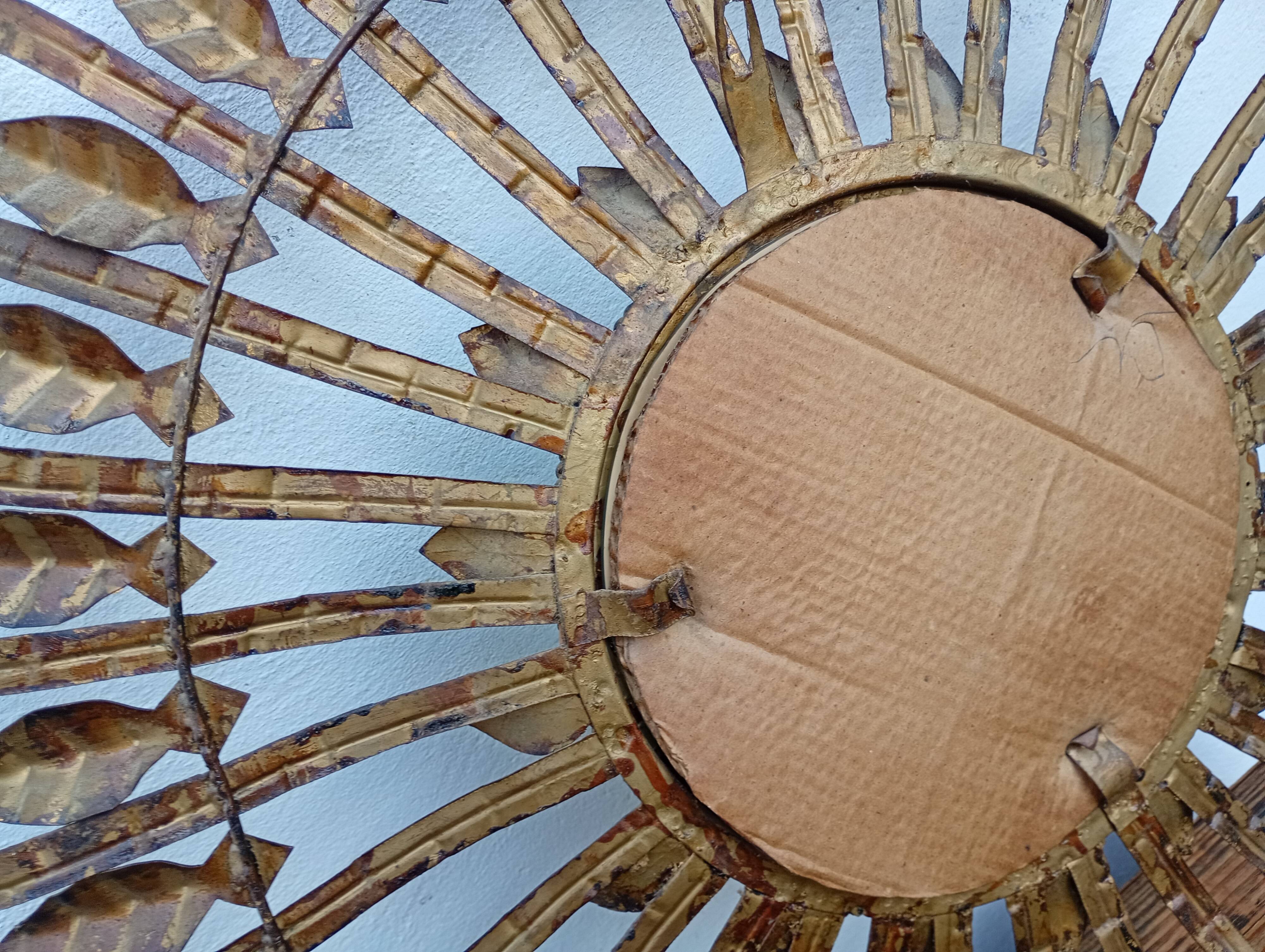 Vintage sun mirror in patinated gold metal – Spain 1950s / 60s