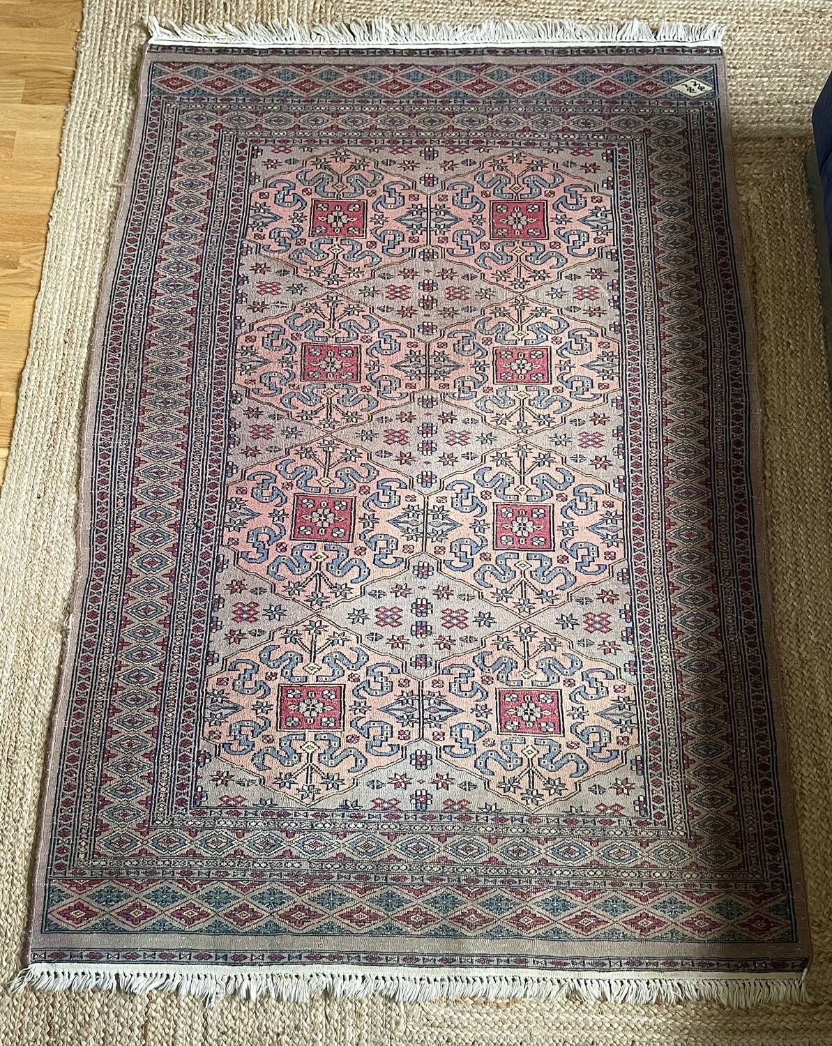 Antique Persian rug, signed.