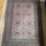 Antique Persian rug, signed.