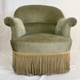 sage green toad armchairs with gold fringe
