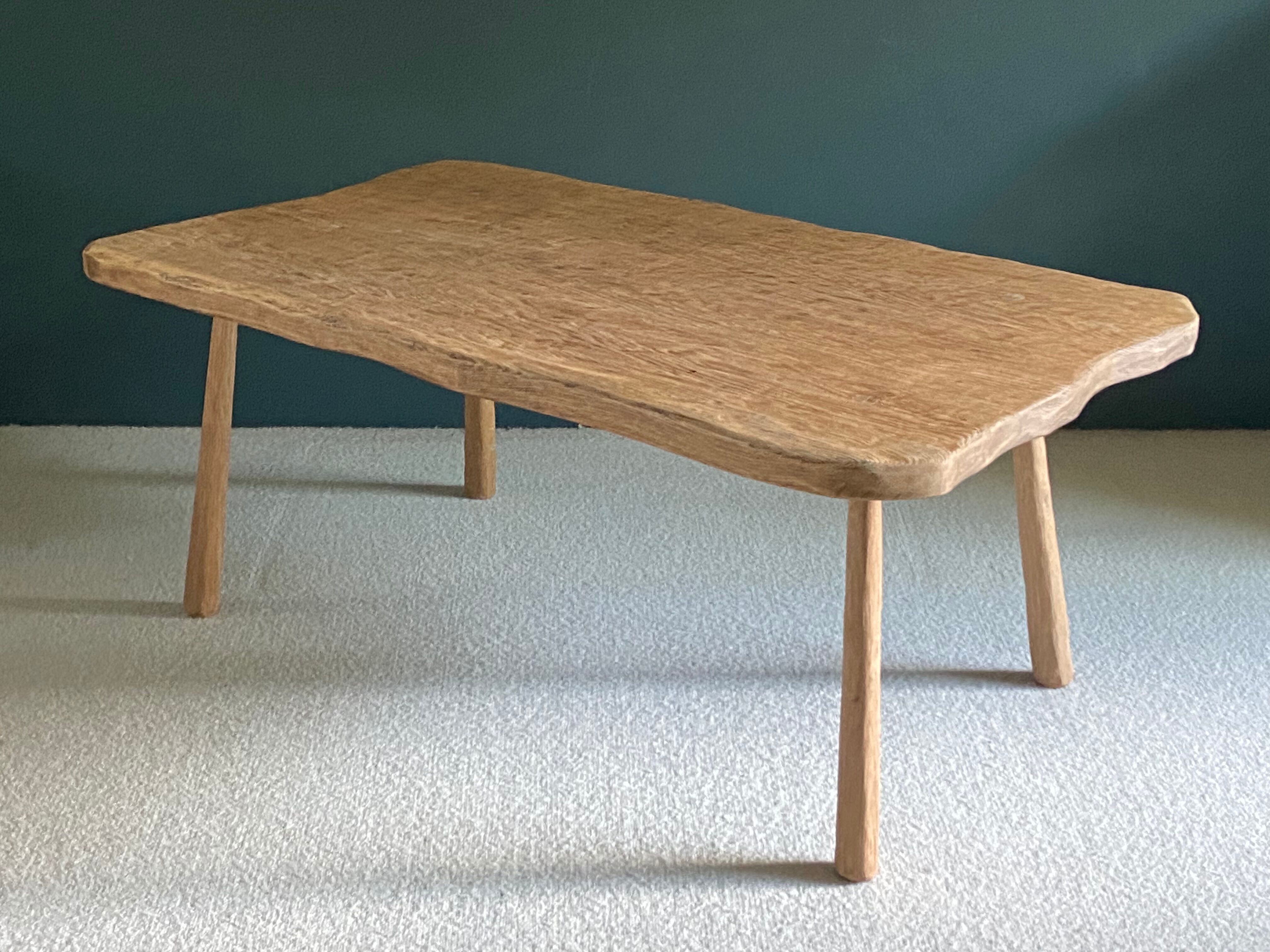 Free-form raw wood coffee table