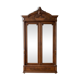 Antique walnut wardrobe with bevelled mirrors.