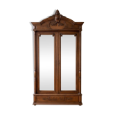 Antique walnut wardrobe with bevelled mirrors.