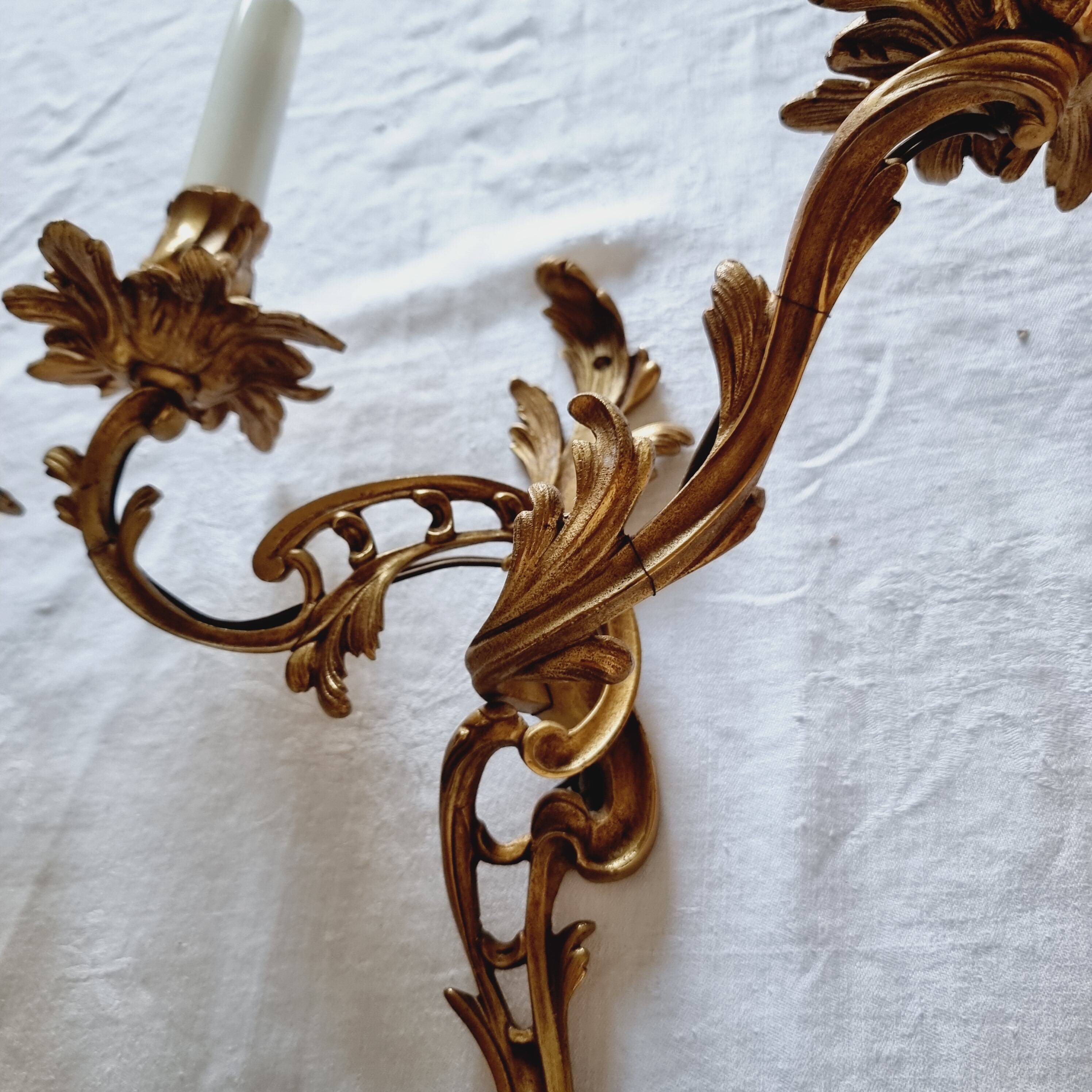 Pair of vintage French wall sconces in bronze, Louis XV Rococo style.