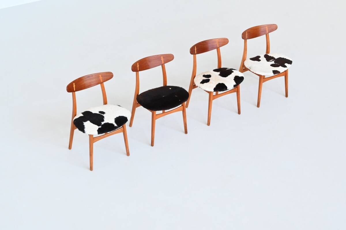 Hans Wegner model CH30 dining chairs in cowskin Carl Hansen Denmark 1952