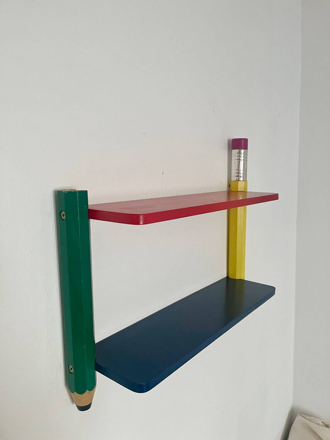 Wall shelf by Pierre Sala giant crayons from the 80s.