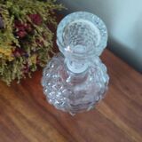 Old carafe in pressed glass grape cluster style