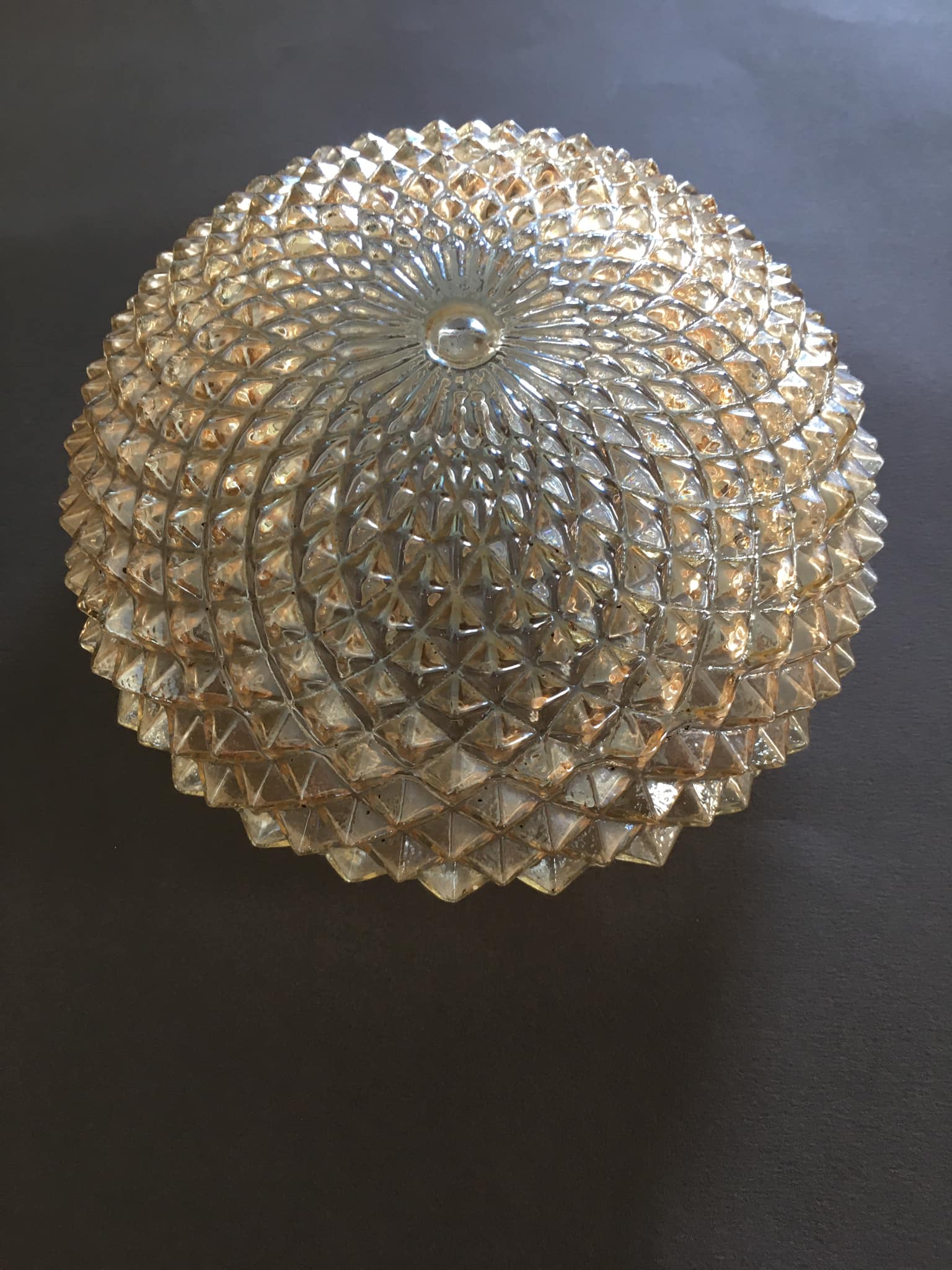 Slightly amber worked glass globe