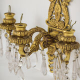 Two bronze and cut glass wall-mounted chandeliers