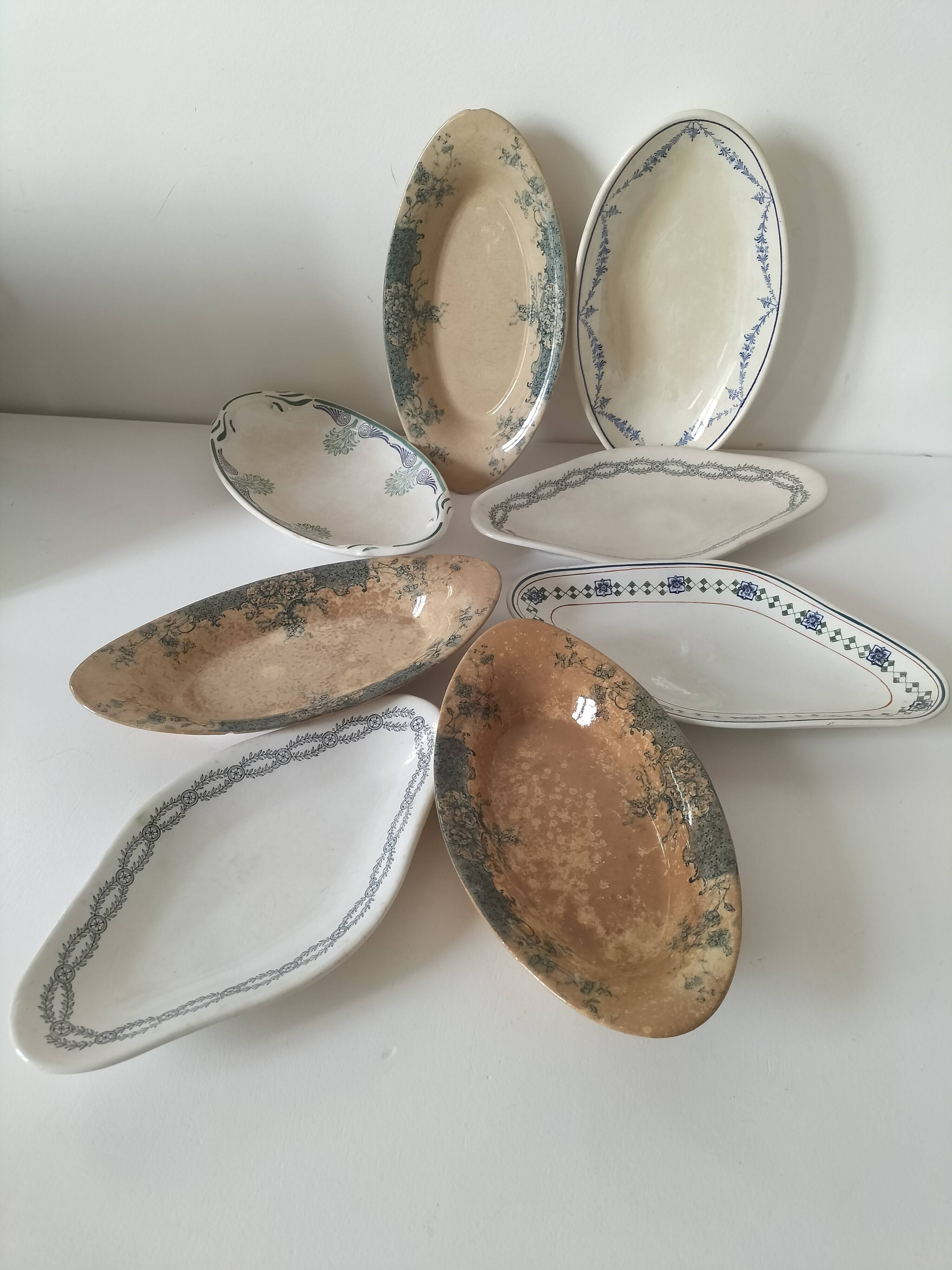Ensemble de 8 raviers anciens en terre de fer