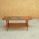 Coffee table in teak and ceramics