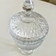 Glass bonbonnière on a pedestal with a lid