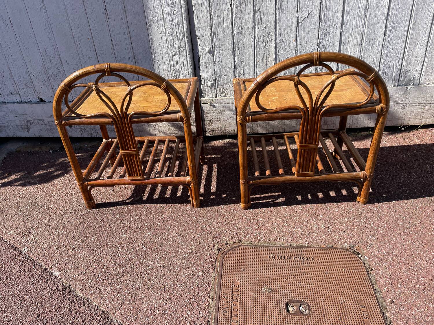 Pair of rattan/wicker bedside tables