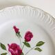 Plate by Amandinoise with a floral art deco rose motif.