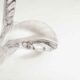 Empty floral pocket crystal of transparent arques signed