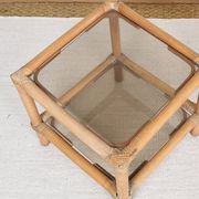 Pair of bedside tables or side tables, in rattan and smoked glass