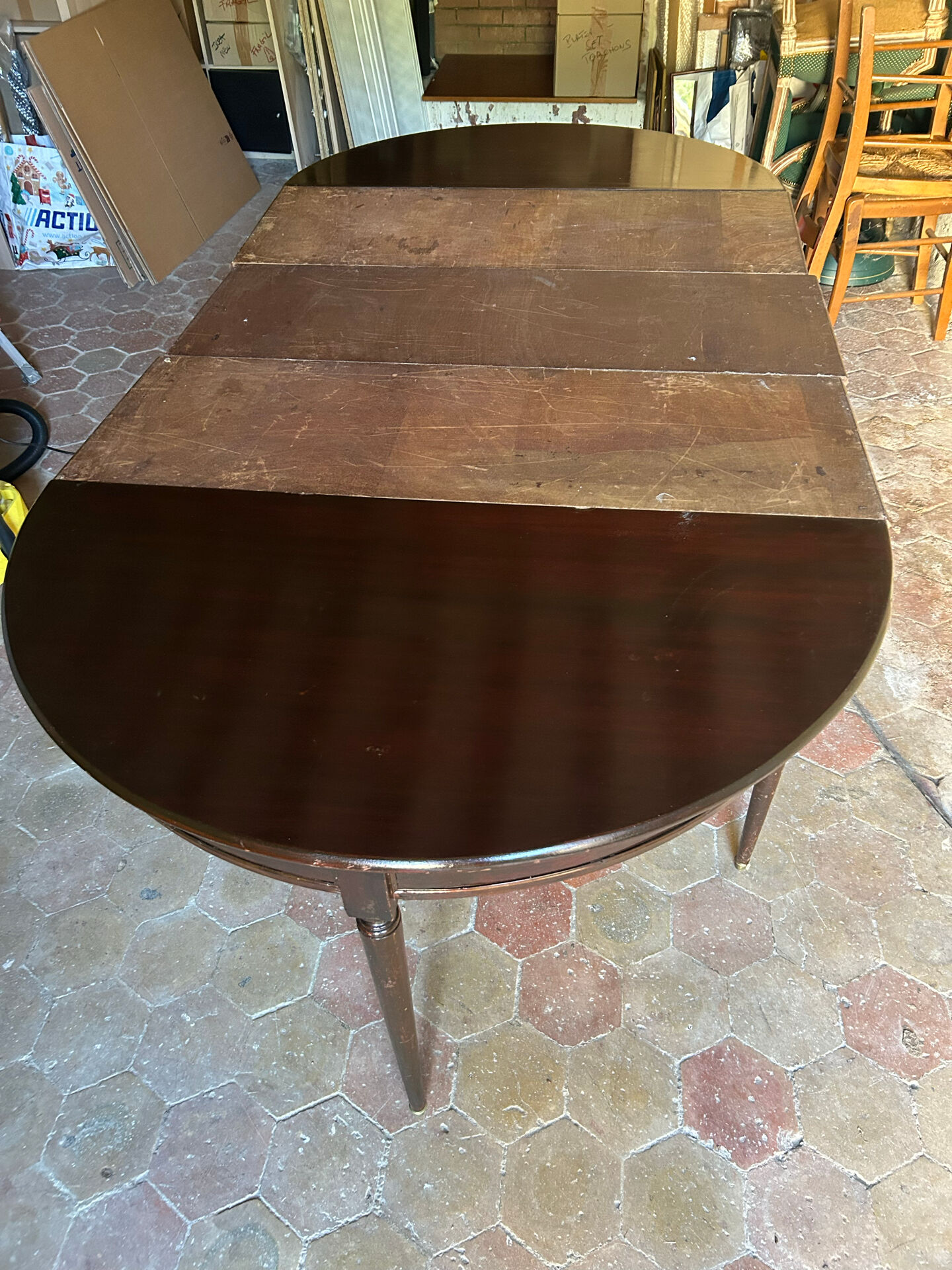 Half-moon table in mahogany, Louis XVI style.