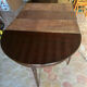 Half-moon table in mahogany, Louis XVI style.