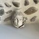 Monk's head candlestick. Antique.