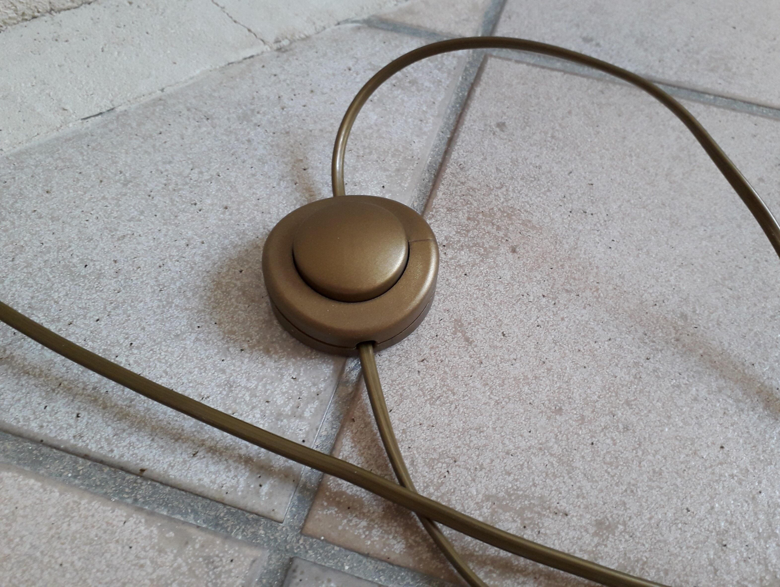 Articulated brass floor lamp