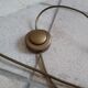 Articulated brass floor lamp