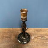 Black table lamp with paint splatters from the 1920s