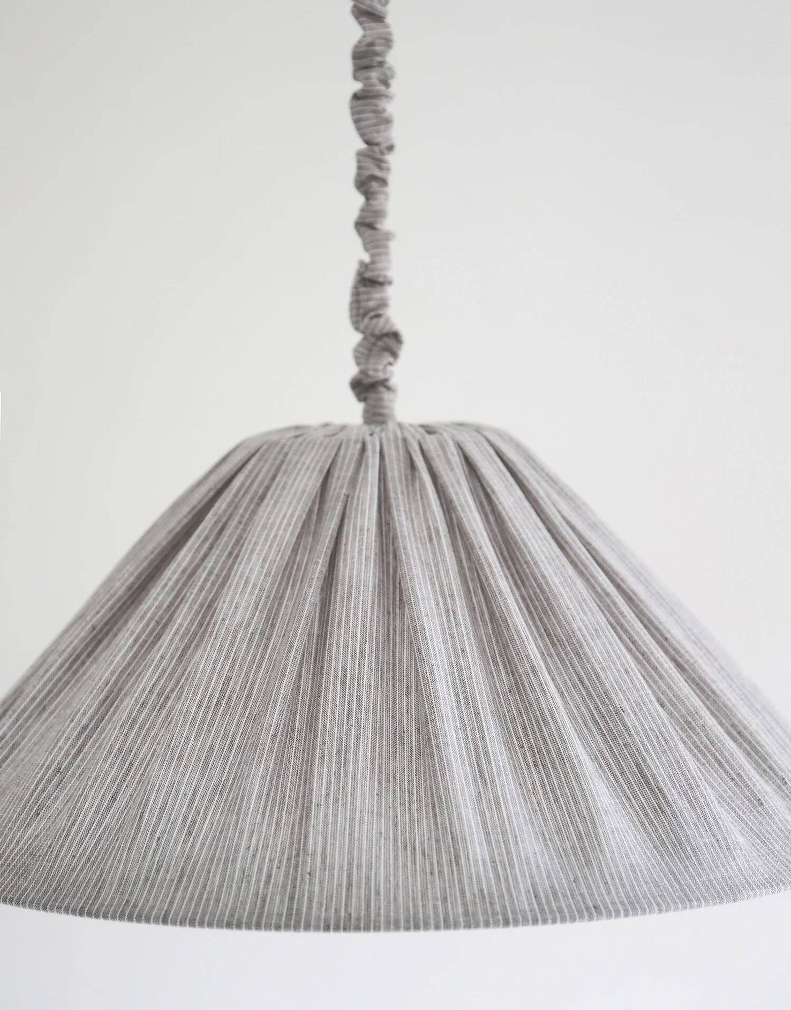 "Malala" pleated linen and cotton suspension with fine classic grey stripes.