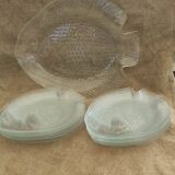 12 plates and a serving dish