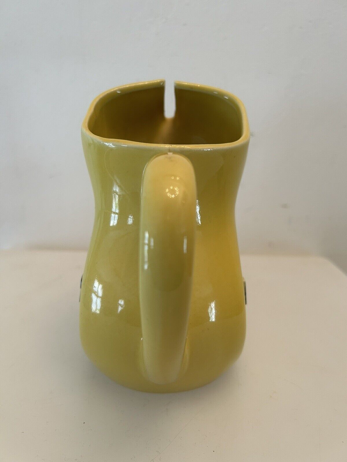 Old yellow pitcher anisette berger syrups, vintage bistro decoration