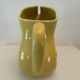 Old yellow pitcher anisette berger syrups, vintage bistro decoration