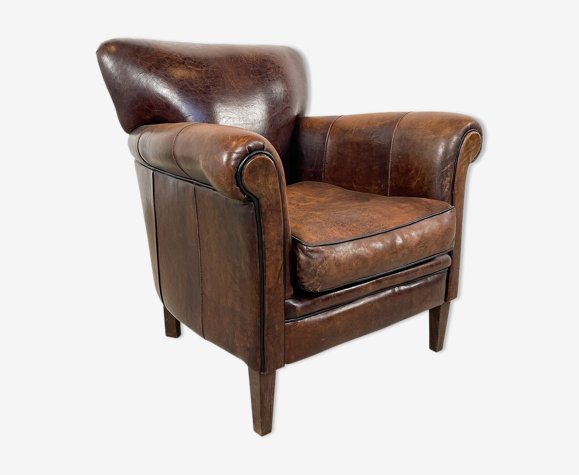 Fauteuil en cuir de mouton foncé fijnaart